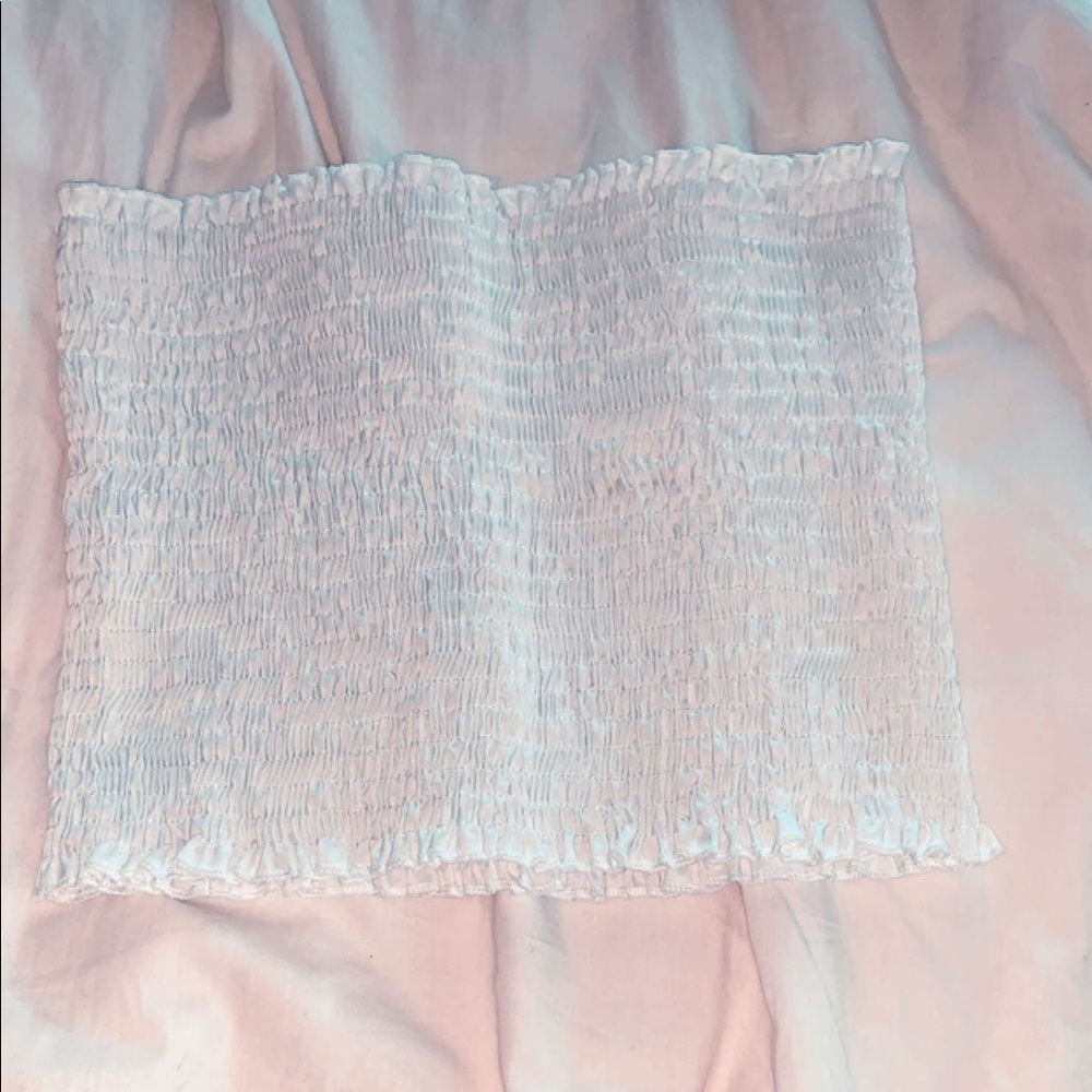 a white stretchy tube top